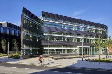 The Big Data Institute in Oxford; a modern chrome and glass building