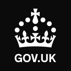 The GOV.UK logo; a white cartoon crown on black