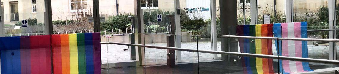 Pride flags on display in the Mathematical Institute; rainbow flag, bisexual pride, transgender pride