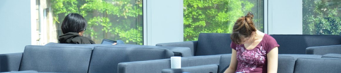 someone reading in the common room