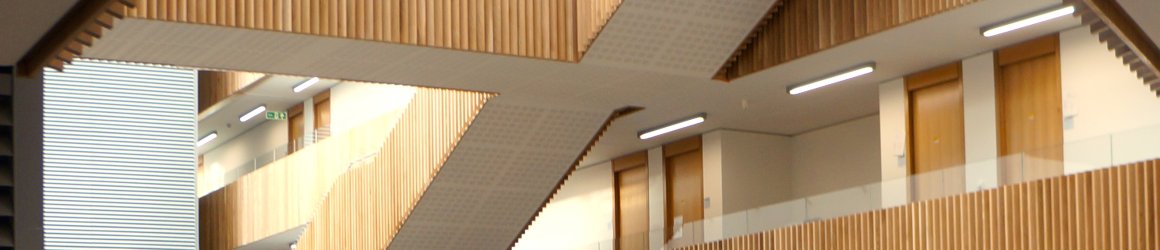 Interior of the Andrew Wiles building showing staircases and office corridors