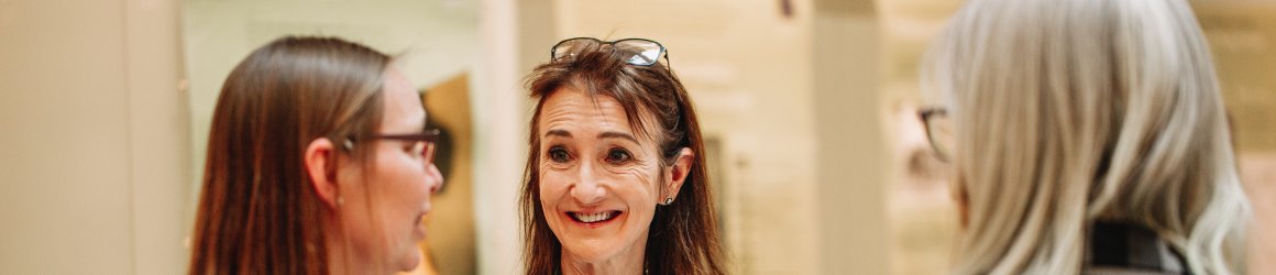 two women in conversation at work