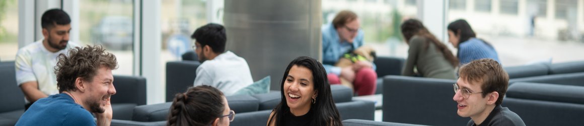 Image of graduate students in the Common Room