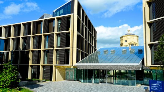 Photo of the Andrew Wiles Building front entrance on a sunny day