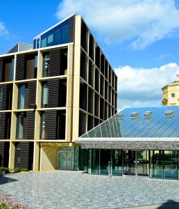 Photo of the Andrew Wiles Building front entrance on a sunny day