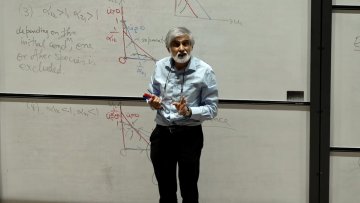 Philip lecturing