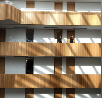 Escher staircase in the Oxford Mathematics Building with sun reflection