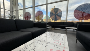 Common Room white tables with maths