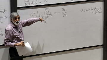 Photo of Philip Maini lecturing