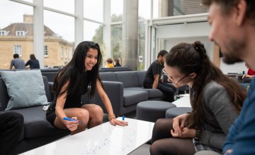 Image of Oxford Mathematics graduate students in the Common Room