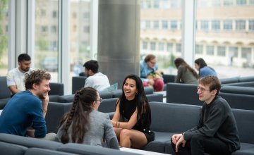 Image of graduate students in the Common Room