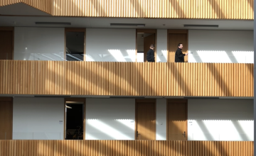 Escher staircase in the Oxford Mathematics Building with sun reflection