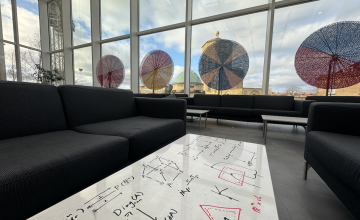 Common Room white tables with maths