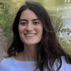 Profile photo, smiling outdoors