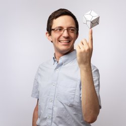 James Munro with a dodecahedron-cube.