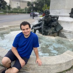 Photo of Clément Virally at a fountain