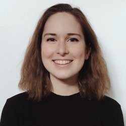 Person with brown hair and black shirt. Person with brown hair and black shirt.