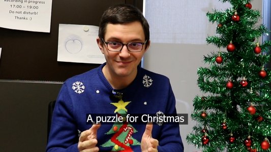 Opening shot of video - James Munro in Christmas jumper Opening shot of video - James Munro in Christmas jumper
