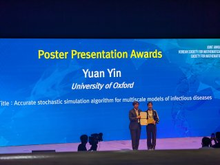 Photo of Yuan receiving prize