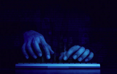 Image of hooded hacker Image of hooded hacker
