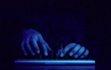 Image of hooded hacker