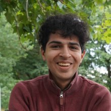 A photo of Matthew Ghosh in a park.