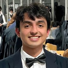 A portrait photograph of Om