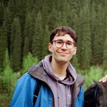 my face with some trees in background
