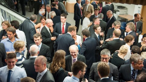 Crowd of smartly dressed people at an event