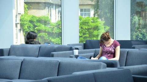 someone reading in the common room