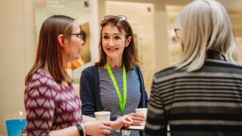 two women in conversation at work
