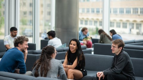 Image of graduate students in the Common Room