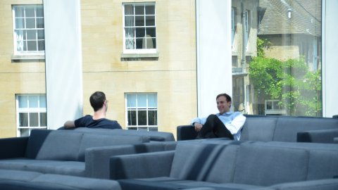 people chatting in the common room